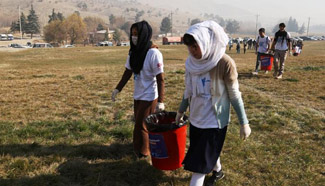 Afghans take part in cleaning campaign on Int'l Volunteer Day in Kabul