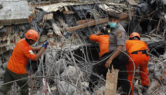 Death toll in Indonesia earthquake climbs to over 97 with more than 600 injured