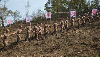 Chinese soldiers complete to clear mines in Yunnan