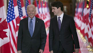 Canadian PM Trudeau greets visitng U.S. VP Biden in Ottawa