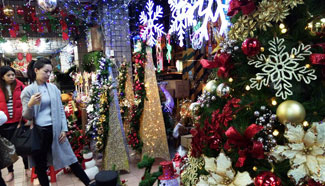 Customers choose Christmas decorations in Taipei
