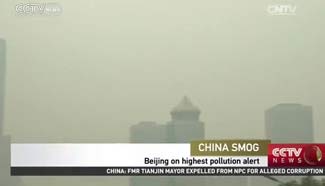 Beijing issues red alert for air pollution