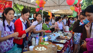 Students of National University of Laos attend food festival