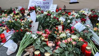 People mourn victims of attack at Christmas market in Berlin