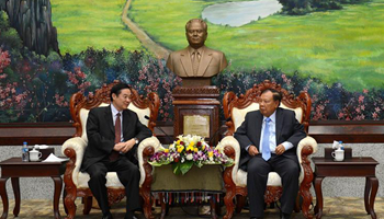 Lao party chief meets with Chinese party official on deepening cooperation