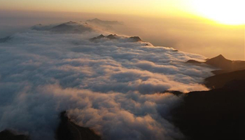 In pics: sea of clouds scenery at Huaying Mountain in SW China