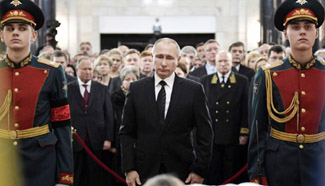 Putin attends memorial service for slain Turkey envoy