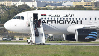 Libyan airplane hijackers surrender, release all hostages