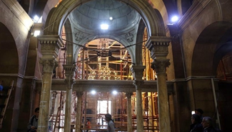 Egyptian workers restore blast-damaged Church in Cairo, Egypt
