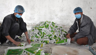 Afghan men work at salt factory in Jawzjan