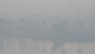 Heavy fog shrouds Nile River in Cairo, Egypt