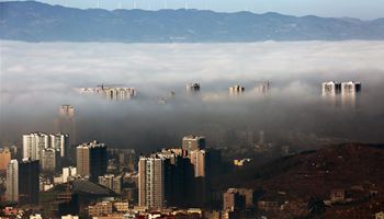 Aerial photos show advection fog above Weining County in SW China