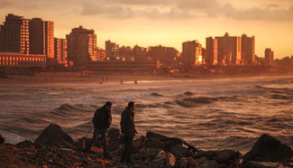 Palestinians enjoy their time during sunset in Gaza City