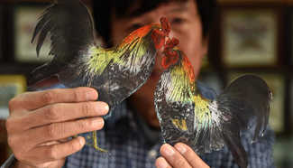 4th generation of Kite Wei craftsman makes kite to mark lunar new year