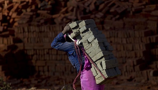 Migrant laborers from India arrive in Nepal to work