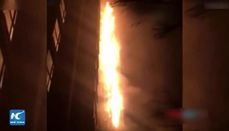 Fire torches 10 floors in residential building in Beijing