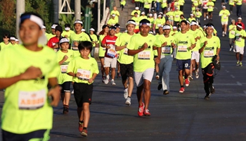Runners take part in Yoma Int'l Marathon 2017 in Yangon, Myanmar