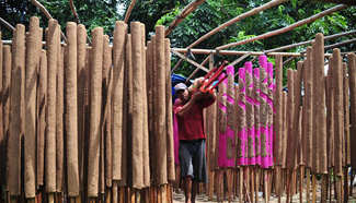 Workers make traditional incense stick in Tangerang, Indonesia