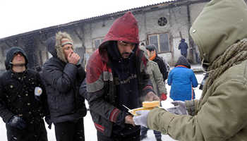 Low temperatures, snowfall worsen situation of migrants in Belgrade