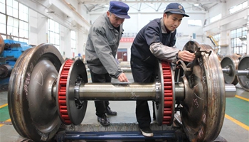 Technicians overhaul train wheelsets for Spring Festival travel rush