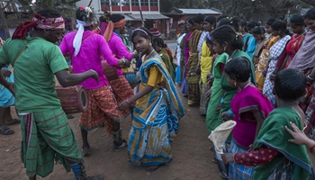 Indians take part in traditional group dance on eve of Makar Sankranti