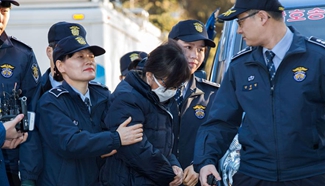 Choi Soon-sil arrives for hearing arguments in Seoul, South Korea