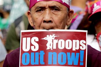 Activists protest against Trump near U.S. Embassy in Manila