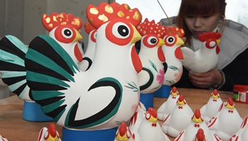 Rooster-shaped clay sculptures made for Chinese lunar New Year