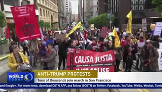 Tens of thousands march against Trump in San Francisco