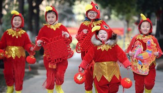 People across China greet upcoming Spring Festival