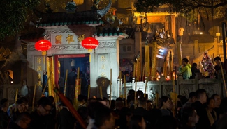 Residents pray for good fortune at A-Ma Temple in Macao