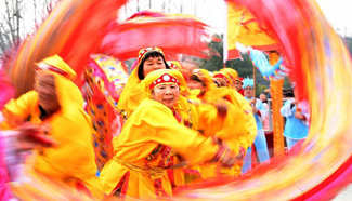 People perform dragon dance in Wuhan