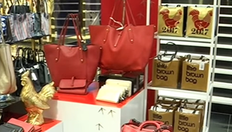 Global retailers attract Chinese New Year consumers with rooster luxury items