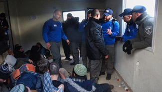 Violence erupts during evacuation of Jewish outpost in West Bank