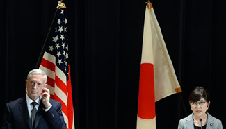 U.S. defense secretary welcomed by Japanese counterpart in Tokyo