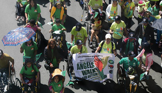 People participate in Angels Walk for Autism in the Philippines
