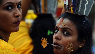 Hindu devotees participate in Thaipusam procession in Singapore