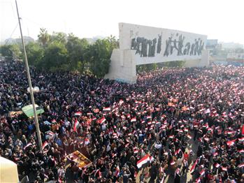 People take part in demonstration demanding reforms in Baghdad