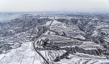 Scenery of snow-covered terrace fields in N China