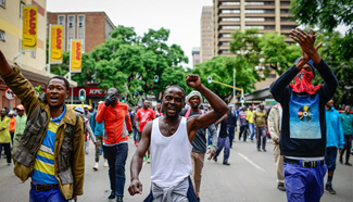 Foreigners clash with local people during protest in Pretoria, S. Africa
