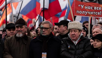 People rally in memory of Russian politician Boris Nemtsov in Moscow