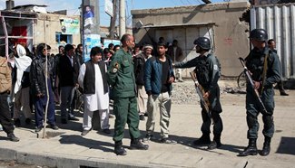 Suicide attack rocks Afghan capital, gun battle continues