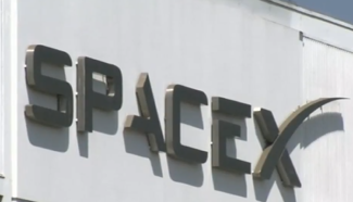SpaceX to send 2 paying passengers into space next year