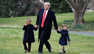 Trump walks with grandchildren to board Marine One from White House
