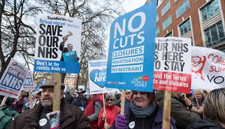 Supporters of Britain's National Health Service rally in London