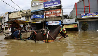 Flood sweeps Bandung, Indonesia