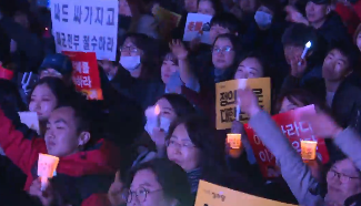 South Koreans hold last candlelight deomonstration against Park Geun-hye
