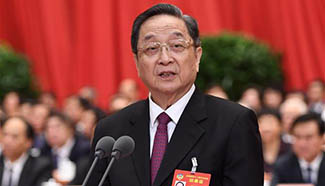 Yu Zhengsheng presides over closing meeting of fifth session of 12th CPPCC National Committee