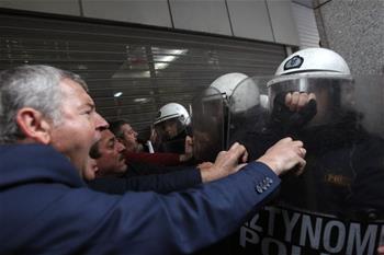 Workers from hospitals clash with police in Athens, Greece