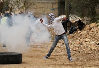 Palestinian protesters clash with Israeli soldiers in Kufr Qadoom village